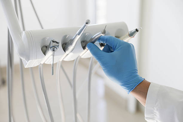 Professional Root Canal Treatment technician working in Macon County County, NC